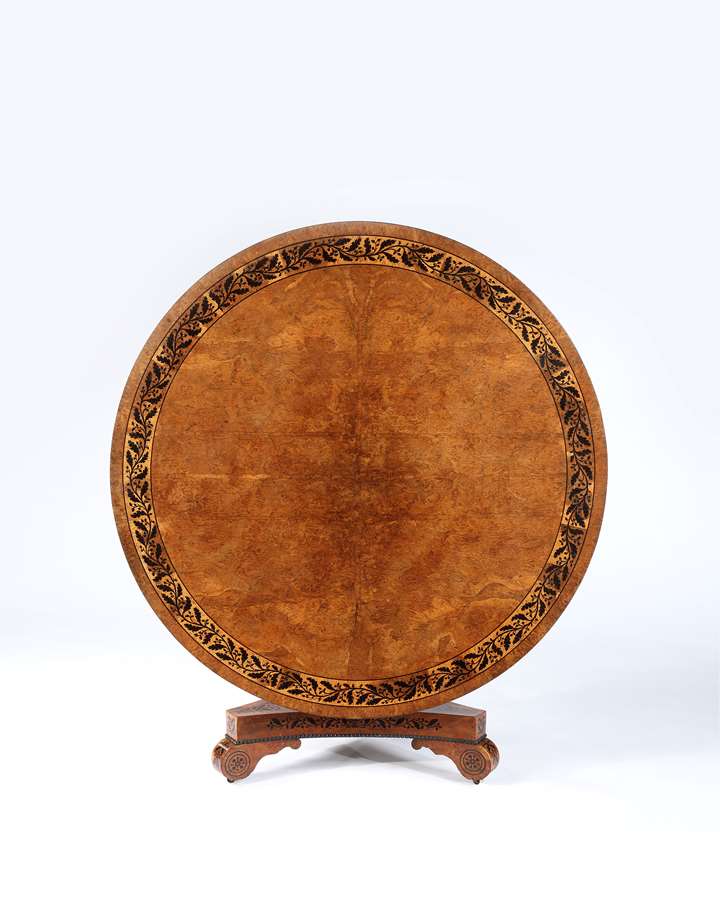 A Fine Regency Period Burr Oak, Oak and Ebony Inlay Circular Table on Triform base